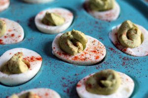 Looking for healthy recipes for your Mardi Gras party? Try these Avocado Deviled Eggs with Smoked Paprika by Amy Gorin Nutrition, plus 17 other dietitian-approved festive dishes!