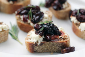 Looking for healthy recipes for your Mardi Gras party? Try these Goat Cheese and Concord Grape Juice Crostini by Amy Gorin Nutrition, plus 17 other dietitian-approved festive dishes!