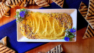 Looking for healthy recipes for your Mardi Gras party? Try this Golden Beet Hummus by Chef Catherine Brown, plus 17 other dietitian-approved festive dishes.