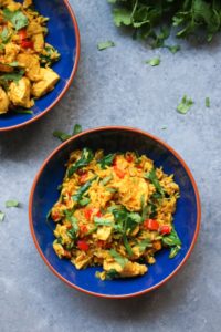 Looking for healthy recipes for your Mardi Gras party? Try this One Pot Chicken & Tumeric Rice by Edwina Clark, Innovation Dietitian + Wellness Expert, plus 17 other dietitian-approved festive dishes!
