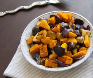 Looking for healthy recipes for your Mardi Gras party? Try this Roasted Butternut Squash & Potato Medley by Foods with Judes, plus 17 other dietitian-approved festive dishes!